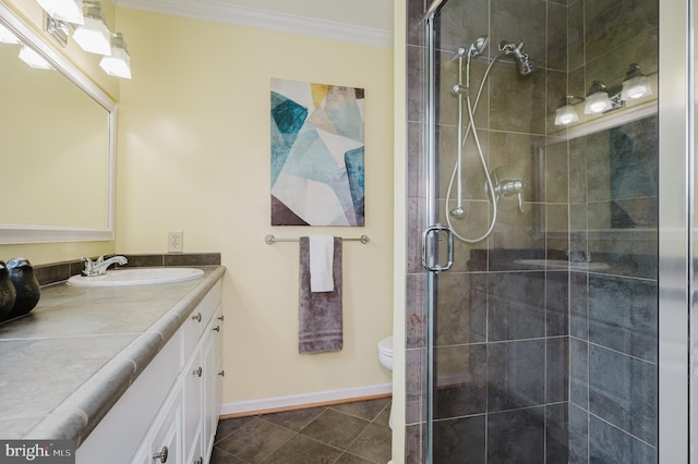 full bath with crown molding, vanity, toilet, baseboards, and a stall shower