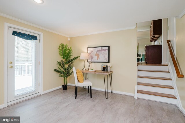 office space with crown molding, baseboards, and a wealth of natural light