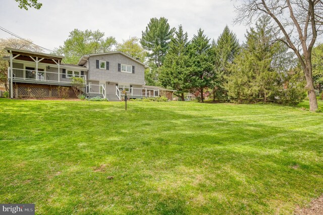 view of yard featuring a deck