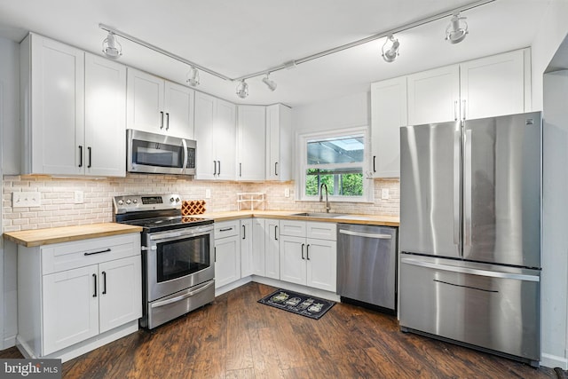 6611 Jupiter Dr, Huntingtown, MD 20639 - kitchen with a sink, white cabinetry, butcher block counters, and stainless steel appliances