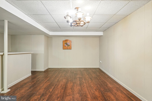 6611 Jupiter Dr, Huntingtown, MD 20639 - below grade area featuring baseboards, a drop ceiling, wood finished floors, and a chandelier