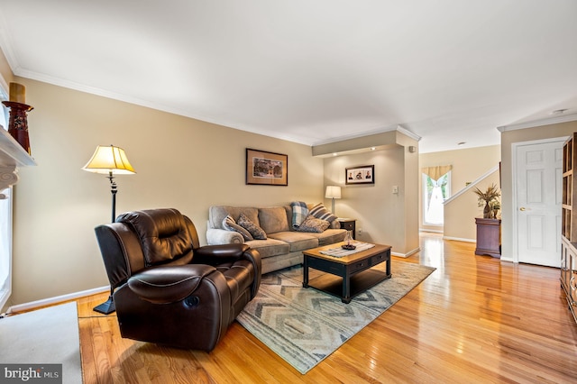 55 E Harrison Rd E Unit 55, West Chester, PA 19380 - living room featuring light wood-style flooring and ornamental molding