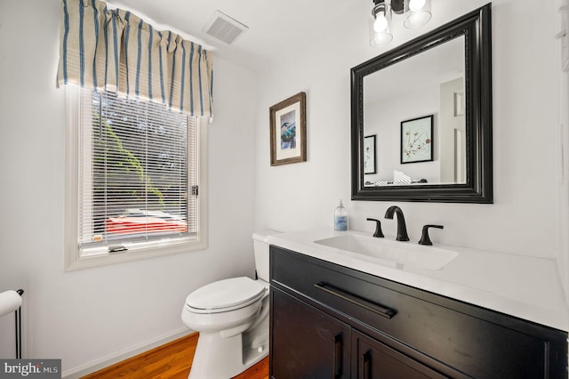 55 E Harrison Rd E Unit 55, West Chester, PA 19380 - half bathroom featuring vanity and wood finished floors