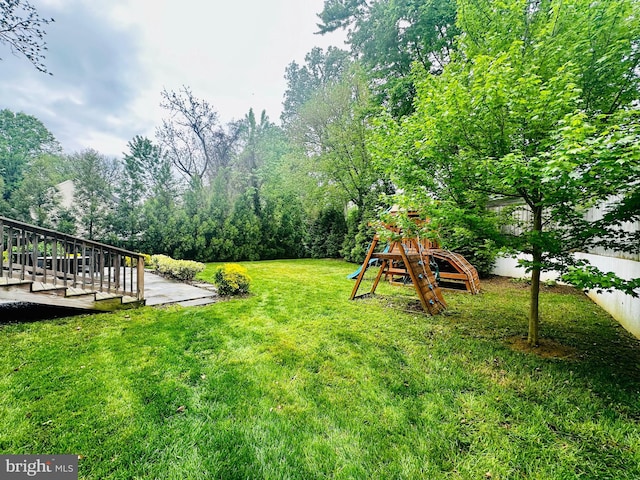 view of yard with a playground