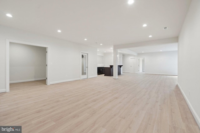 11632 Pine Tree Dr, Fairfax, VA 22033 - unfurnished living room with light wood-type flooring, recessed lighting, and baseboards
