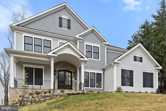 11632 Pine Tree Dr, Fairfax, VA 22033 - view of front of property with a front lawn, covered porch, stone siding, and french doors
