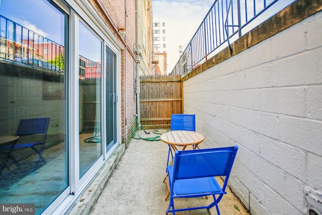 view of patio with fence
