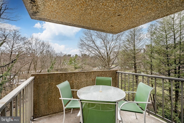 balcony featuring outdoor dining area