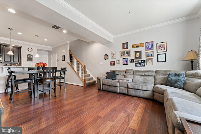 living area featuring visible vents, dark wood finished floors, stairs, ornamental molding, and recessed lighting