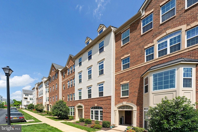 view of property with a residential view