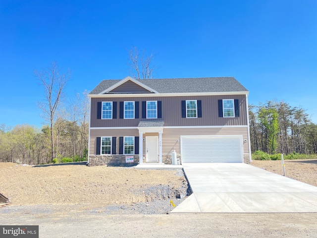 224 Sanibel Way, Martinsburg, WV 25405 - view of front of house with driveway, a shingled roof, an attached garage, and stone siding