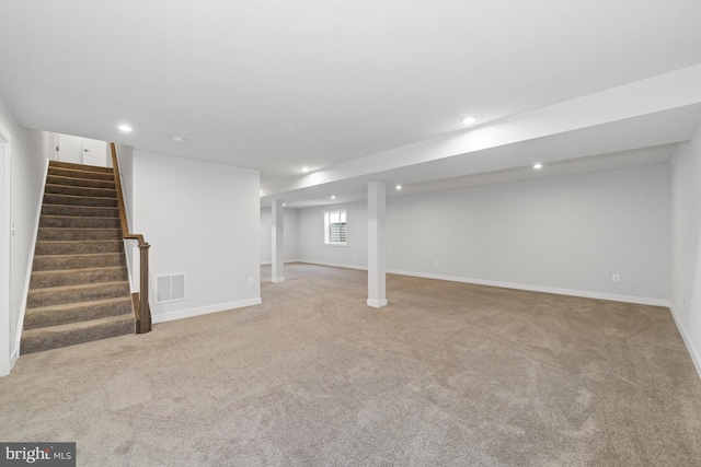 147 Parker Dr, Middletown, DE 19709 - below grade area featuring stairs, light colored carpet, visible vents, and recessed lighting