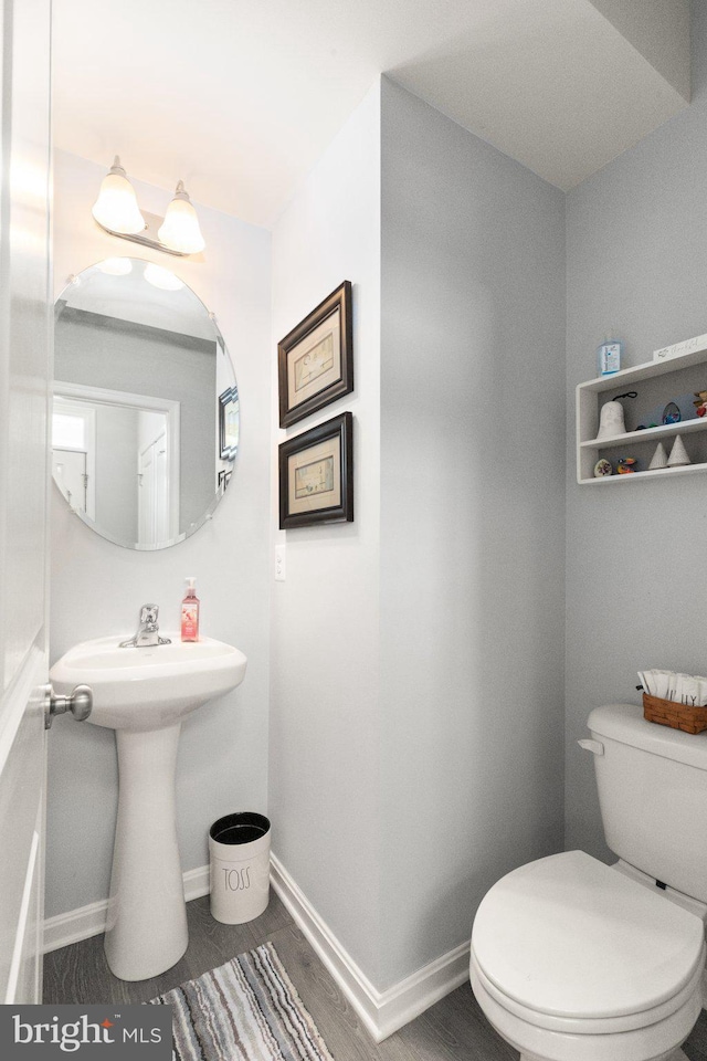 418 N Stokes, Havre De Grace, MD 21078 - half bathroom with baseboards and toilet