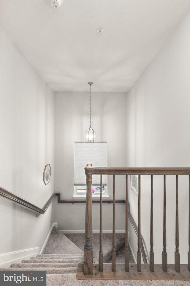 418 N Stokes, Havre De Grace, MD 21078 - stairs with baseboards, an inviting chandelier, and carpet flooring
