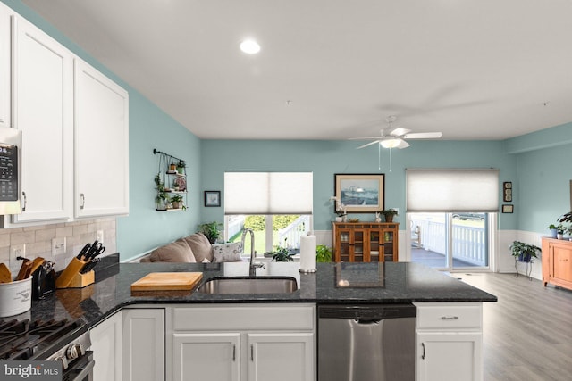 418 N Stokes, Havre De Grace, MD 21078 - kitchen with a sink, stainless steel appliances, a ceiling fan, white cabinetry, and open floor plan