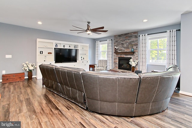 108 Chimney Swift Rd, Fredericksburg, VA 22406 - living room featuring baseboards, ceiling fan, a wealth of natural light, and a fireplace