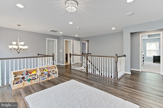 108 Chimney Swift Rd, Fredericksburg, VA 22406 - interior space featuring baseboards, an inviting chandelier, wood finished floors, and visible vents