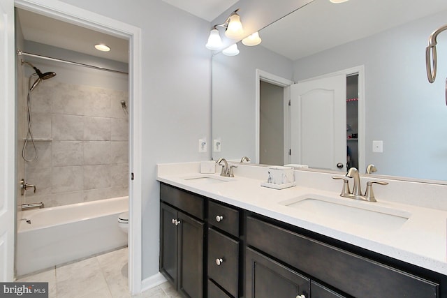 108 Chimney Swift Rd, Fredericksburg, VA 22406 - bathroom with double vanity, a sink, tile patterned flooring, and toilet