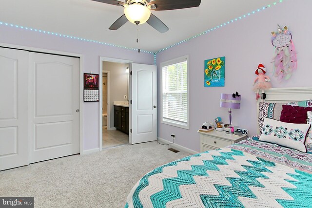 108 Chimney Swift Rd, Fredericksburg, VA 22406 - bedroom with visible vents, a closet, baseboards, light colored carpet, and connected bathroom