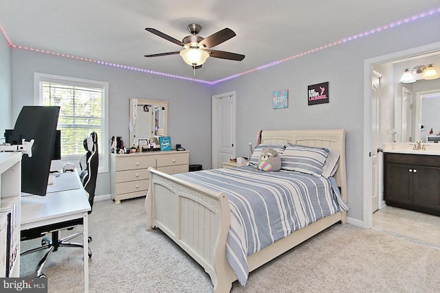 108 Chimney Swift Rd, Fredericksburg, VA 22406 - bedroom with baseboards, ceiling fan, light carpet, and ensuite bath
