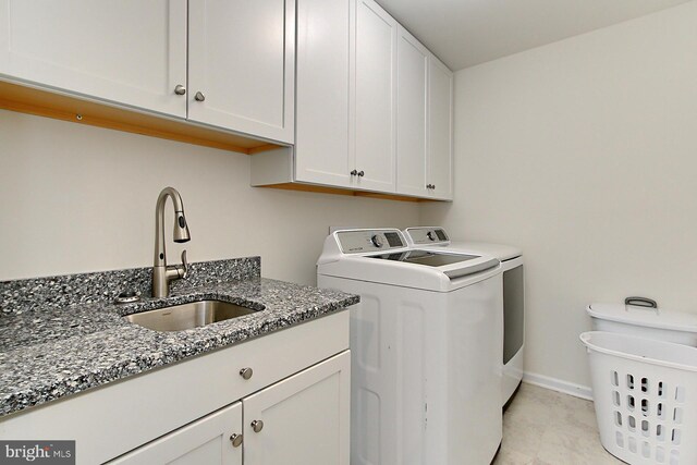 108 Chimney Swift Rd, Fredericksburg, VA 22406 - laundry room with cabinet space, baseboards, washer and clothes dryer, and a sink