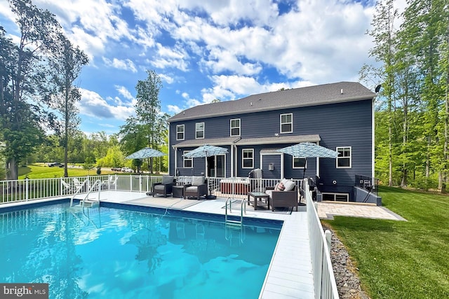 108 Chimney Swift Rd, Fredericksburg, VA 22406 - back of property featuring a fenced in pool, outdoor lounge area, a yard, and a deck