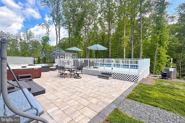 108 Chimney Swift Rd, Fredericksburg, VA 22406 - view of swimming pool featuring a swimming pool, a hot tub, and a patio area