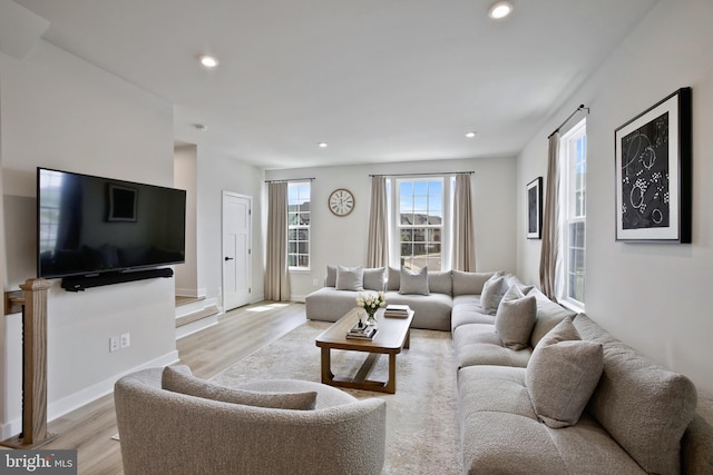 14030 Sunrise Valley Dr, Herndon, VA 20171 - living room with baseboards, recessed lighting, and light wood-style flooring