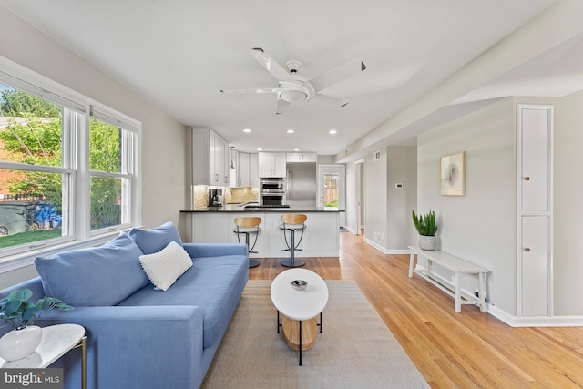 610 Valley Brook Dr, Silver Spring, MD 20904 - living area with baseboards, a ceiling fan, recessed lighting, and light wood-style flooring