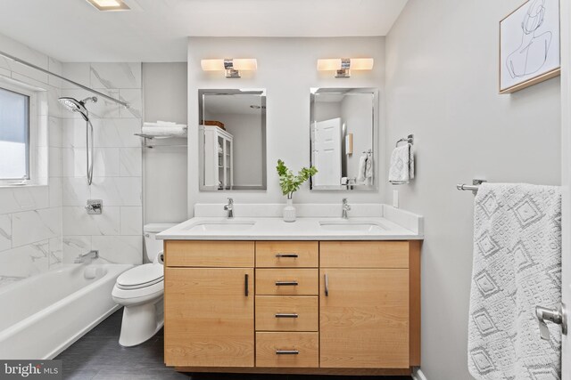 610 Valley Brook Dr, Silver Spring, MD 20904 - full bath with a sink, toilet, double vanity, and shower / washtub combination