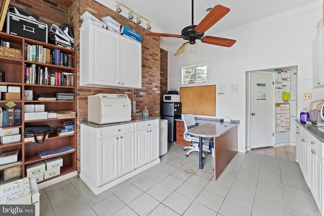 610 Valley Brook Dr, Silver Spring, MD 20904 - interior space with light tile patterned floors, ceiling fan, ornamental molding, and white cabinetry