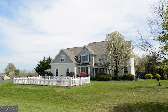 2350 Josie Ln, Harleysville, PA 19438 - view of front of property featuring fence, a front lawn, and stone siding