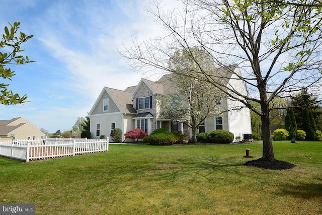 2350 Josie Ln, Harleysville, PA 19438 - cape cod-style house featuring a front lawn and fence