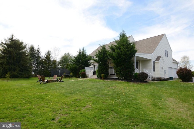 2350 Josie Ln, Harleysville, PA 19438 - view of yard featuring covered porch and a fire pit