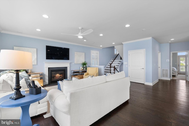 29710 Seagrass Ct, Dagsboro, DE 19939 - living area with crown molding, stairs, a ceiling fan, and recessed lighting