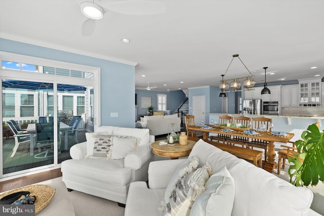 29710 Seagrass Ct, Dagsboro, DE 19939 - living area featuring a ceiling fan, recessed lighting, stairway, and crown molding