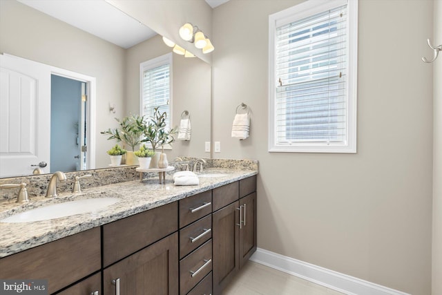 29710 Seagrass Ct, Dagsboro, DE 19939 - full bathroom with baseboards, double vanity, and a sink