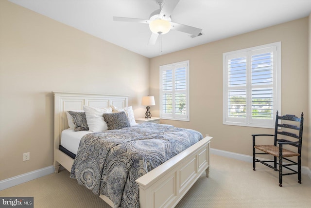 29710 Seagrass Ct, Dagsboro, DE 19939 - bedroom featuring light colored carpet, visible vents, baseboards, and ceiling fan