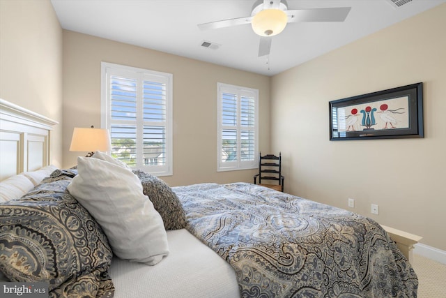 29710 Seagrass Ct, Dagsboro, DE 19939 - carpeted bedroom with visible vents, baseboards, and a ceiling fan