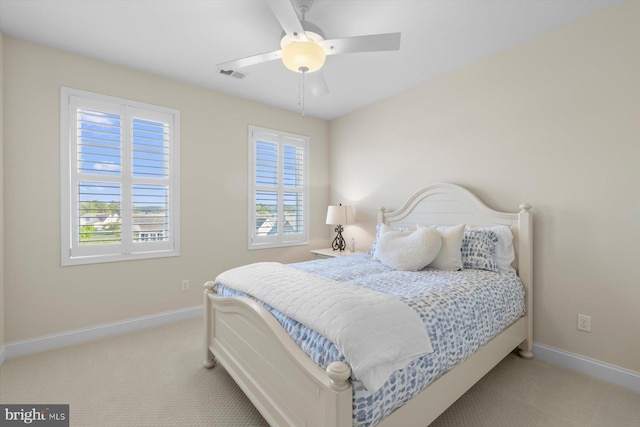 29710 Seagrass Ct, Dagsboro, DE 19939 - bedroom with carpet flooring, multiple windows, visible vents, and baseboards