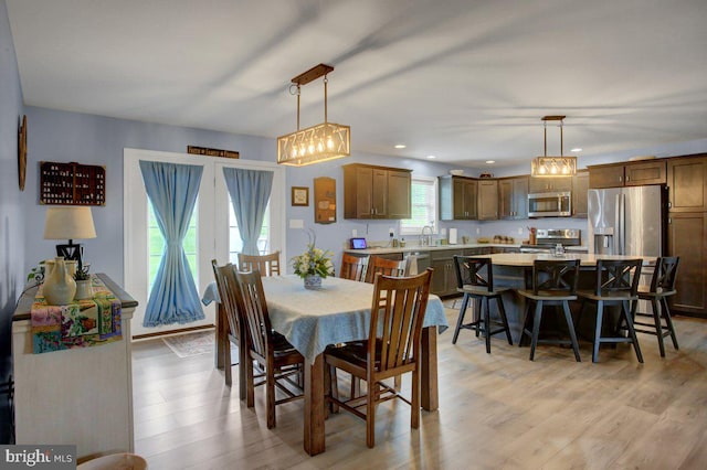 230 Meadowcreek Dr N, Chambersburg, PA 17202 - dining room with an inviting chandelier, light wood-style floors, and recessed lighting