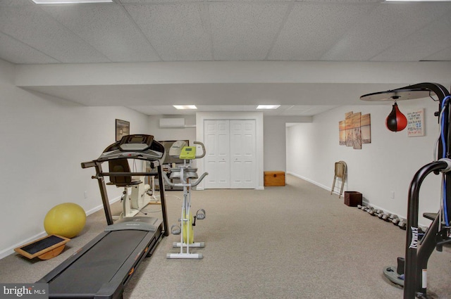 230 Meadowcreek Dr N, Chambersburg, PA 17202 - exercise room with carpet flooring, a wall mounted air conditioner, and baseboards