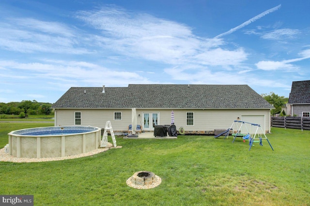 230 Meadowcreek Dr N, Chambersburg, PA 17202 - rear view of property featuring a yard, fence, a patio, and a fire pit