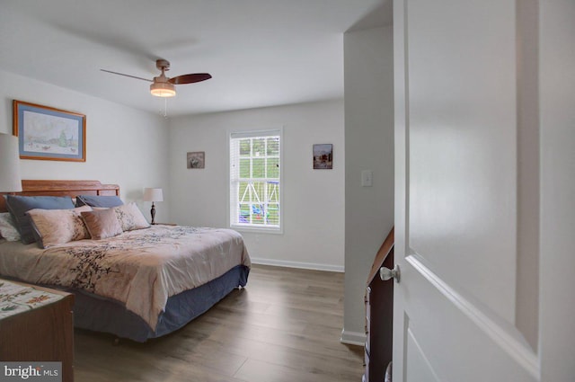 230 Meadowcreek Dr N, Chambersburg, PA 17202 - bedroom with baseboards, a ceiling fan, and wood finished floors