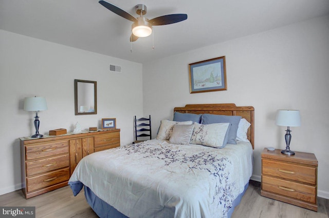 230 Meadowcreek Dr N, Chambersburg, PA 17202 - bedroom featuring baseboards, a ceiling fan, visible vents, and wood finished floors