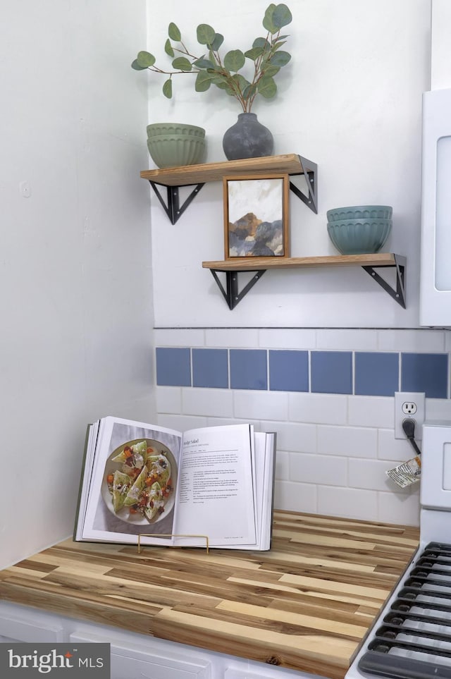 room details with backsplash and open shelves