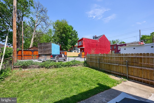 view of yard with a fenced backyard