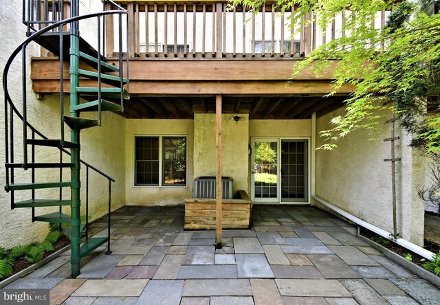 view of patio featuring cooling unit