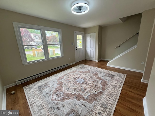 28 Wenner Dr, Brunswick, MD 21716 - entrance foyer featuring wood finished floors, baseboards, and a baseboard heating unit