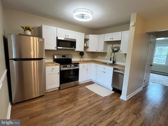 28 Wenner Dr, Brunswick, MD 21716 - kitchen featuring a sink, open shelves, white cabinets, appliances with stainless steel finishes, and dark wood-style floors